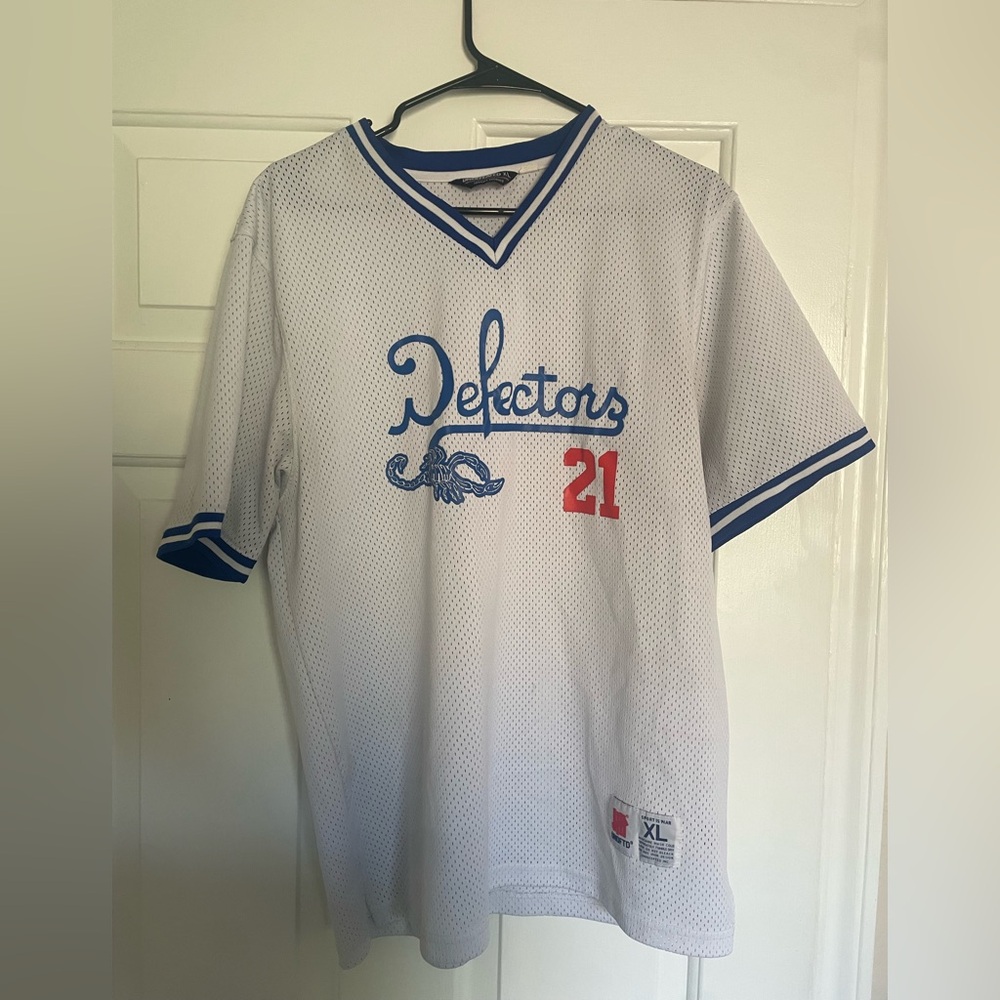 Undefeated “Defectors” V-neck jersey